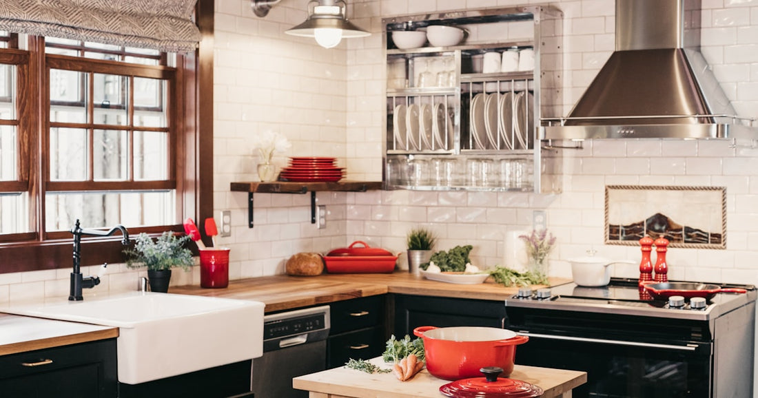 Microwave oven on a 2-tier metal rack in a modern Indian kitchen