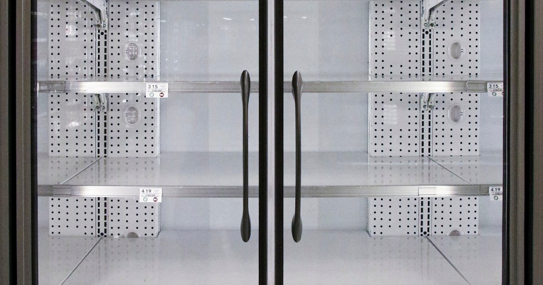Clean, organized refrigerator with containers and labeled sections